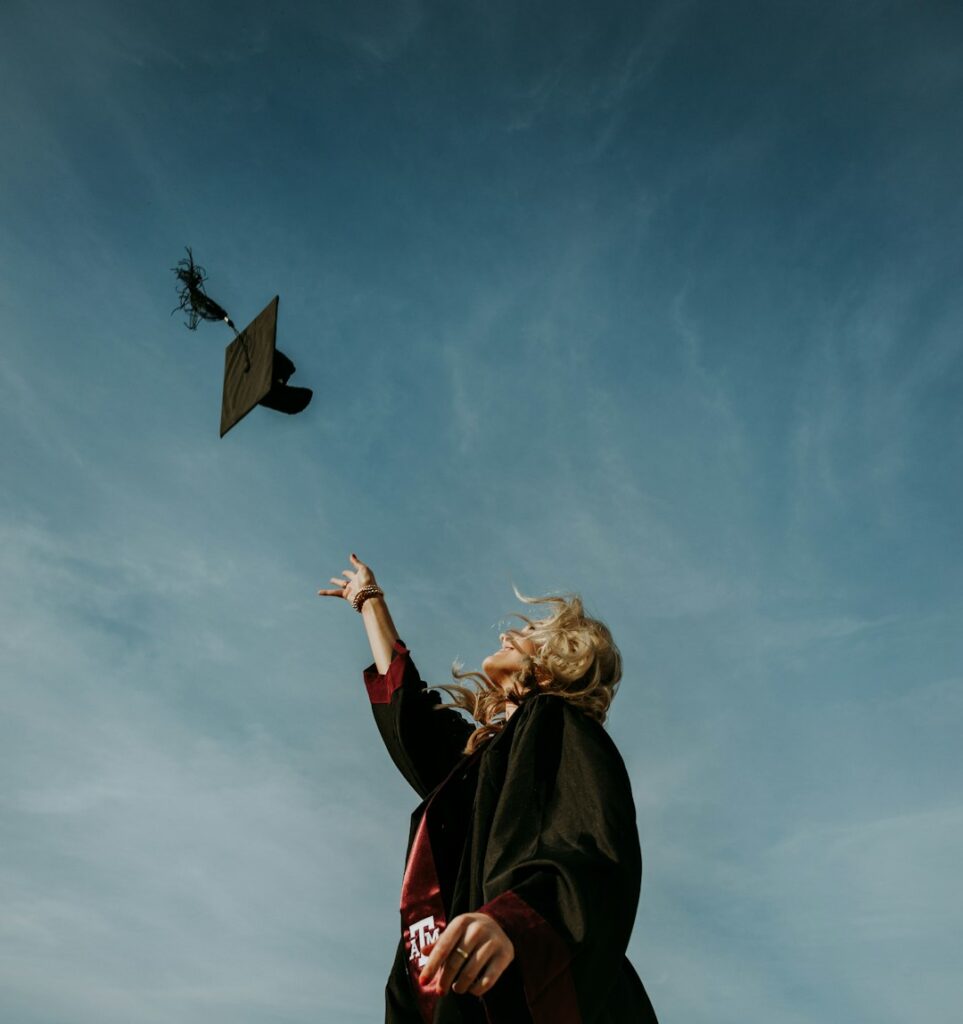 Graduate tossing cap, student scholarship and support schemes
