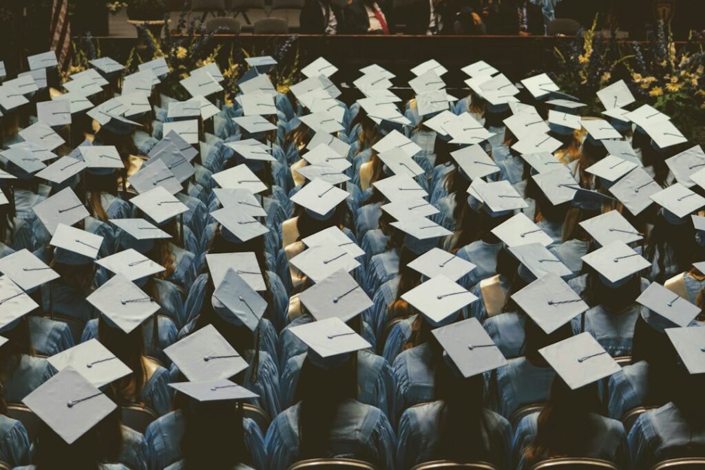 Graduates in caps and gowns, scholarship for Pakistani students